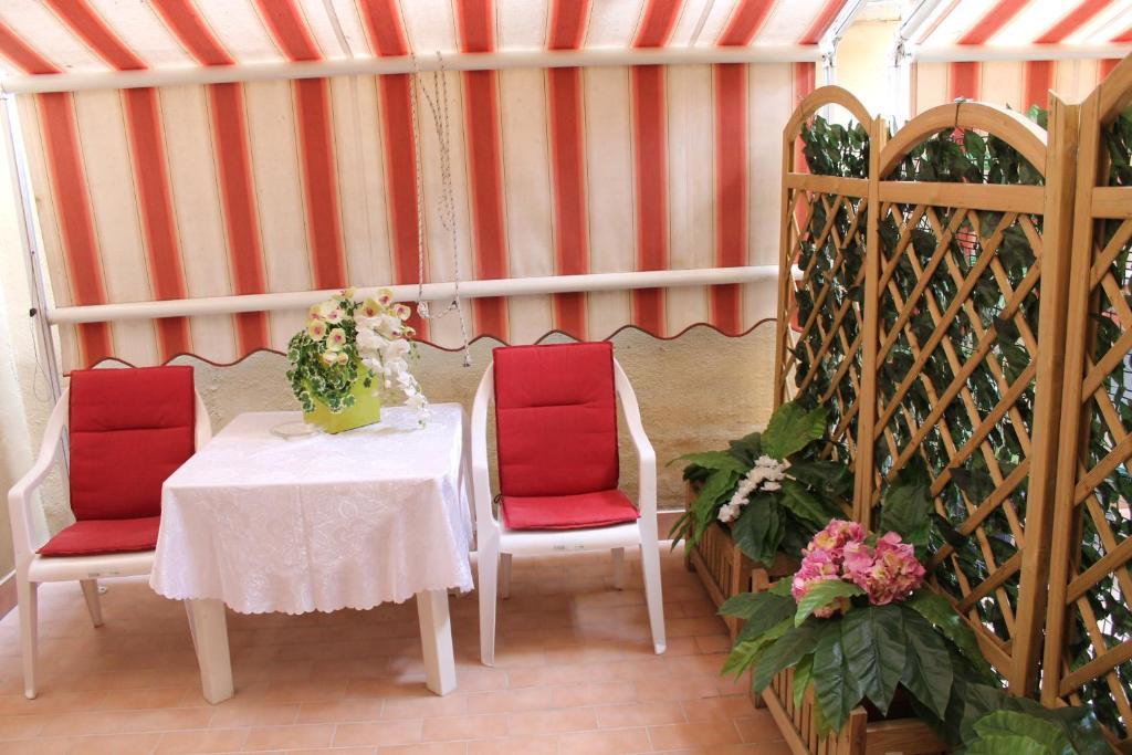 Nel Sole Appartamenti Bolonia Habitación foto